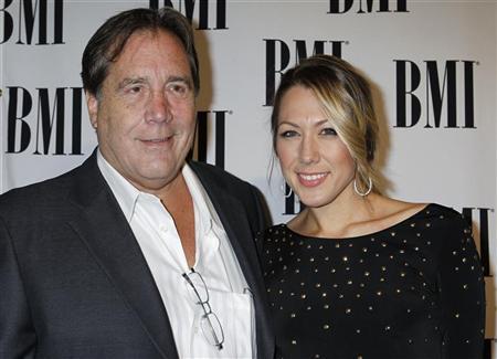 Singer and songwriter Colbie Caillat arrives with her father Ken Caillat at the 59th Annual BMI Pop Awards in Beverly Hills, California May 17, 2011. REUTERS/Fred Prouser