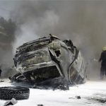 A Civil Defence member extinguishes a fire at the site of an explosion outside Syria's highest court in central Damascus June 28, 2012. REUTERS/SANA/Handout