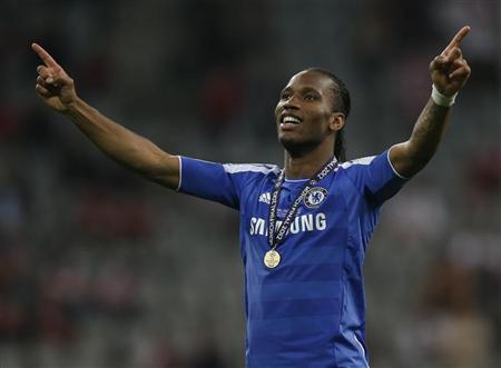 Chelsea's Didier Drogba celebrates victory in their Champions League final soccer match against Bayern Munich at the Allianz Arena in Munich, May 19, 2012. REUTERS/Wolfgang Rattay
