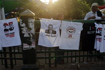 A shirt with a picture of elected president Mohamed Mursi, with words that read "Congratulations to Egypt", is sold during a sit-in at Tahrir Square A shirt with a picture of elected president Mohamed Mursi, with words that read "Congratulations to Egypt", is sold during a sit-in at Tahrir Square in Cairo, June 27, 2012. REUTERS/Asmaa Waguih