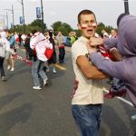 A Russian soccer fan (R) fights with a Polish supporter in Warsaw June 12, 2012. REUTERS/Peter Andrews