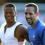 France's soccer players Patrice Evra (L) and Franck Ribery (R) react during a training session at the team's training center in Kircha near Donetsk June 12, 2012. REUTERS/Charles Platiau
