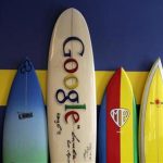 Surfboards lean against a wall at the Google office in Santa Monica, California, in this October 11, 2010 file photo. REUTERS/Lucy Nicholson/Files