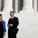 Justice Elena Kagan talks to Chief Justice of the United States John Roberts outside the Supreme Court following her formal investiture ceremony in Washington October 1, 2010. REUTERS/Larry Downing
