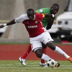 Kenya's Dennis Oliech (L) dribbles against Malawi's Moses Chavula during their African qualifier soccer match for the 2014 World Cup in Brazil, in Nairobi June 2, 2012. REUTERS/Noor Khamis