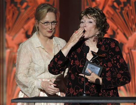 Actress MacLaine blows kiss at taping of the AFI Life Achievement Award in Los Angeles Actress Shirley MacLaine (R) blows a kiss to the audience at the end of her speech at the TV Land cable channel taping of the AFI Life Achievement Award, honoring MacLaine, in Los Angeles June 7, 2012. Actress Meryl Streep (L), recipient of the award in 2004, presented the award to MacLaine. The show will be telecast June 24. REUTERS/Fred Prouser