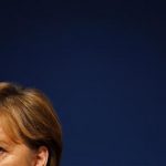 German Chancellor and leader of Germany's conservative Christian Democratic Union (CDU), Angela Merkel listens to the speech of party general secretary Hermann Groehe during the party convention at the fairground in Leipzig, November 14, 2011. REUTERS/Kai Pfaffenbach