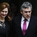 Britain's former Prime Minister Gordon Brown and wife Sarah leave the Leveson Inquiry at the High Court in London, June 11, 2012. REUTERS/Luke MacGregor