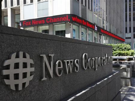 A sign is seen outside News Corporation building in New York, June 27, 2012. REUTERS/Brendan McDermid