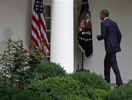 Obama walks back to the Oval Office after making remarks about the leaked Afghan war documents at the White House in Washington U.S. President Barack Obama walks back to the Oval Office after making remarks about the leaked Afghan war documents in the Rose Garden at the White House in Washington, July 27, 2010. REUTERS/Jim Young