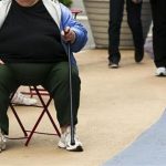 An overweight woman sits on a chair in Times Square in New York, May 8, 2012. REUTERS/Lucas Jackson
