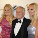Playboy magazine founder Hugh Hefner and girlfriends Anna Sophia Berglund (L) and Shera Bechard arrive at the Society of Singers annual dinner in Beverly Hills, California September 19, 2011. REUTERS/Fred Prouser