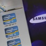 The Samsung Electronics logo is seen on a laptop computer screen (R) in front of an advertisement board promoting Intel processors at a store in Seoul June 21, 2012. REUTERS/Choi Dae-woong