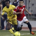 Egypt's Mohamed Salah (R) fights for the ball with Mozambique's Martinho Mucana during their 2014 World Cup Brazil qualifying soccer in Egypt, June 1, 2012. REUTERS/Amr Abdallah Dalsh