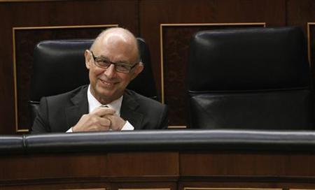 Spain's Treasury and Public Administration Minister Montoro attends a session at the Spanish parliament in Madrid Spain's Treasury and Public Administration Minister Cristobal Montoro attends a session at the Spanish parliament in Madrid June 13, 2012. REUTERS/Andrea Comas