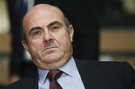 Spain's Economy Minister de Guindos waits for the start of an EU finance ministers meeting in Luxembourg Spain's Economy Minister Luis de Guindos waits for the start of a European Union finance ministers meeting in Luxembourg June 22, 2012. REUTERS/Francois Lenoir