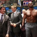 Actor Terry Crews (R) poses shirtless next to his fellow "The Expendables" cast members Sylvester Stallone (L) and Dolph Lundgren (C) for photographers on the floor of the New York Stock Exchange August 19, 2010. Cast members from the film rang the opening bell at the New York Stock Exchange on Thursday. REUTERS/Brendan McDermid