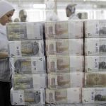 New Syrian currency notes (R to L: 200, 100, 50 Syrian pounds) are seen on display at the central bank in Damascus July 27, 2010. REUTERS/Khaled al-Hariri
