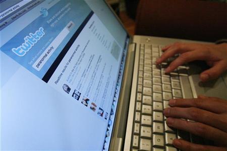 A Twitter page is displayed on a laptop computer in Los Angeles October 13, 2009. REUTERS/Mario Anzuoni