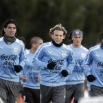 Uruguay's national soccer team players jog during a team practice in Montevideo June 4, 2012. REUTERS/Andres Stapff