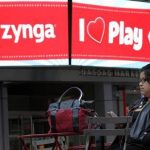The corporate logo for Zynga is seen on a screen outside the Nasdaq Market Site in New York, December 16, 2011. REUTERS/Brendan McDermid