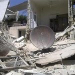 A damaged building is seen at al-Midan neighbourhood in Damascus July 22, 2012. REUTERS/Shaam News Network/Handout