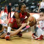 Natalie Stafford of Team GB (L) and Rose Anderson (R) challenge Tamika Catchings (C) of Team USA during their Olympic women's exhibition basketball game ahead of the London 2012 Olympic Games at the M.E.N Arena in Manchester, northern England, July 18, 2012. REUTERS/Nigel Roddis