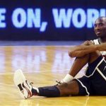 Olympic basketball player Kobe Bryant stretches during a training session at Palau Sant Jordi in Barcelona, July 21, 2012. REUTERS/Albert Gea