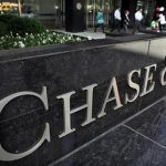 People exit the lobby of JPMorgan Chase & Co. headquarters in New York, May 17, 2012. REUTERS/Eduardo Munoz