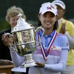 Na-Yeon Choi of South Korea holds the championship trophy after winning the U.S. Women's Open golf tournament at Blackwolf Run in Kohler, Wisconsin July 8, 2012. REUTERS/John Gress
