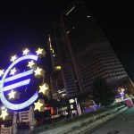 A sculpture showing the Euro currency sign is seen in front of the European Central Bank (ECB) headquarters in Frankfurt June 29, 2012. REUTERS/Alex Domanski