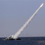 A new medium-range missile is fired from a naval ship during Velayat-90 war game on Sea of Oman near the Strait of Hormuz in southern Iran January 1, 2012. REUTERS/Jamejamonline/Ebrahim Norouzi