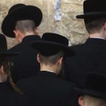 Ultra-Orthodox Jews take part in a morning prayer at the Western Wall, Judaism's holiest prayer site, in Jerusalem's Old City May 31, 2012. REUTERS/Ronen Zvulun