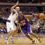 Los Angeles Lakers guard Kobe Bryant (R) drives past Dallas Mavericks guard Jason Kidd during the second half of their NBA basketball game in Dallas, Texas March 21, 2012. REUTERS/Mike Stone