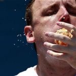 Joey Chestnut competes in the 2012 Nathan's Famous Fourth of July International Eating Contest at Coney Island in the Brooklyn borough of New York July 4, 2012. REUTERS/Eric Thayer