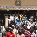 Members of the banned Mombasa Republican Concil (MRC) group gather outside the Mombasa Law Courts in the Kenyan coastal city of Mombasa April 24, 2012.REUTERS/Peter Imbote