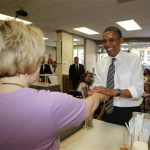 U.S. President Barack Obama buys ice cream at Deb's Ice Cream and Deli in Cedar Rapids, Iowa, July 10, 2012. REUTERS/Jason Reed
