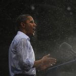 U.S. President Barack Obama speaks in the rain during a campaign rally in Glen Allen, Virginia, July 14, 2012. REUTERS/Jason Reed