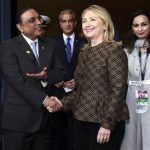 U.S. Secretary of State Hillary Clinton (center R) shakes hands with Pakistan's President Asif Ali Zardari before a bi-lateral meeting at the NATO summit in Chicago May 20, 2012. REUTERS/Bob Strong