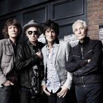 The Rolling Stones' Mick Jagger, Keith Richards, Ronnie Wood and Charlie Watts (L-R) pose in front of The Marquee Club in London in this handout photograph received by Reuters on July 11, 2012. The picture was taken by photographer Rankin to mark the fiftieth anniversary of the Rolling Stones' first ever live performance on July 12, 1962 at the iconic venue on London's Oxford Street. An exhibition of photos from Rolling Stones 50 will be held at London's Somerset House from July 13 to August 27. REUTERS/Rankin/Handout
