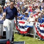 U.S. Republican presidential candidate and former Massachusetts Governor Mitt Romney smiles with his wife Ann (L) after addressing a crowd of supporters after taking part in the Wolfeboro Fourth of July Parade in Wolfeboro, New Hampshire July 4, 2012. REUTERS/Jessica Rinaldi