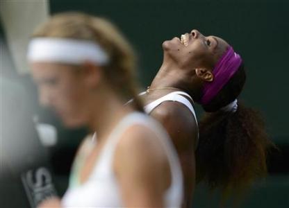 Serena Williams of the U.S. celebrates after defeating Victoria Azarenka of Belarus (L) in their women's semi-final tennis match at the Wimbledon tennis championships in London July 5, 2012. REUTERS/Dylan Martinez