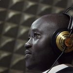 Mading Ngor broadcasts his morning radio program "Wake up Juba" from the studio of Bakhita Radio in Juba May 28, 2012. REUTERS/Adriane Ohanesian