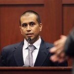 George Zimmerman, with lawyer Mark O'Mara testifies (R) from the stand at the Seminole County Courthouse for a bond hearing on second degree murder charges in the shooting death of Trayvon Martin in Sanford, Florida, in this April 20, 2012, file photo. REUTERS/Gary W. Green/POOL/Files