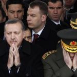 Turkey's Prime Minister Tayyip Erdogan (L) and Chief of Staff General Ilker Basbug pray during a funeral in Ankara in this February 28, 2010 file photo. REUTERS/Umit Bektas/Files