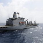 The U.S. Navy supply ship USNS Rappahannock maintains station as it prepares a replenishment at sea in this U.S. Navy photo handout photo taken in the South China Sea March 21, 2012. REUTERS/MC3 Cale Hatch/US Navy/Handout