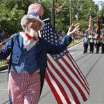 Jeffrey Silverstone, dressed as "Uncle Sam," marches in the Takoma Park Independence Day parade during celebrations of the United States' Fourth of July Independence Day holiday in Takoma Park, Maryland July 4, 2012. REUTERS/Jim Bourg