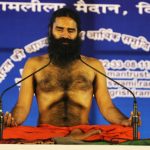 Baba Ramdev performs yoga with protesters in New Delhi