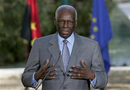 Angola's President Jose Eduardo dos Santos talks to journalists after a signature agreement ceremony held at Sao Bento Palace in Lisbon March 11, 2009. REUTERS/Hugo Correia