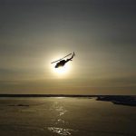 A helicopter flies over Arctic ice towards the Applied Physics Laboratory Ice Station (APLS) during an exercise near the 2011 APLS camp north of Prudhoe Bay, Alaska, in this March 18, 2011 picture. REUTERS/Lucas Jackson